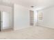 Bedroom featuring a walk-in closet and bright natural light from the window at 24047 W Cocopah St, Buckeye, AZ 85326