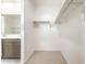 Walk-in closet with carpet and built-in storage, offering ample space at 24047 W Cocopah St, Buckeye, AZ 85326