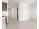 Open-concept layout with tile flooring leading to various rooms in the home at 24047 W Cocopah St, Buckeye, AZ 85326