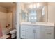 This bathroom has a white vanity with storage and a tub and shower combination at 2821 S Skyline Dr # 157, Mesa, AZ 85212