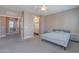 This bedroom has neutral tones and easy access to the bathroom at 2821 S Skyline Dr # 157, Mesa, AZ 85212