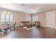 Bright living room boasts hardwood floors, neutral walls, and plentiful windows at 2821 S Skyline Dr # 157, Mesa, AZ 85212