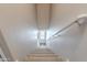 Carpeted staircase leading to the upper level, offering a seamless transition between floors in the home at 2821 S Skyline Dr # 157, Mesa, AZ 85212