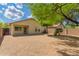This private backyard has desert landscaping, offering low maintenance and unobstructed views at 29161 N Lilly Ln, San Tan Valley, AZ 85143