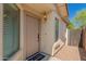 Charming front entrance featuring a welcoming door, stylish light fixture, and a cute welcome mat at 29161 N Lilly Ln, San Tan Valley, AZ 85143