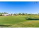 Expansive view of the golf course, showcasing the lush green fairway at 29161 N Lilly Ln, San Tan Valley, AZ 85143