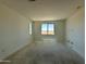 A bright bedroom featuring windows that offer abundant natural light, creating a cozy atmosphere with multiple electrical outlets at 3013 E Mecklenburg Way, San Tan Valley, AZ 85143