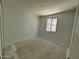 Bright bedroom with natural light from a window, smooth walls, offering a blank canvas for personal style at 3013 E Mecklenburg Way, San Tan Valley, AZ 85143