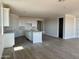 Modern kitchen with white cabinetry, stainless steel appliances, and a stylish island at 3013 E Mecklenburg Way, San Tan Valley, AZ 85143