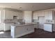 Bright kitchen featuring white cabinets, a center island, and modern finishes at 3013 E Mecklenburg Way, San Tan Valley, AZ 85143