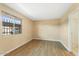Cozy bedroom with modern floors, neutral walls, and a window at 3314 N 68Th St # W112, Scottsdale, AZ 85251