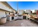 This home's community also boasts a fully equipped outdoor kitchen featuring stainless steel grills at 3314 N 68Th St # W112, Scottsdale, AZ 85251
