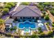 The estate includes a sparkling pool, built-in kitchen, luxury seating, and mature landscaping offering a serene retreat at 35443 N 87Th Pl, Scottsdale, AZ 85266