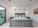 Bedroom with ample lighting and accent tables at 35443 N 87Th Pl, Scottsdale, AZ 85266