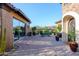 Inviting courtyard offers desert landscaping and a seating area for outdoor enjoyment at 35443 N 87Th Pl, Scottsdale, AZ 85266