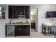 Kitchenette featuring sink, microwave and refrigerator at 35443 N 87Th Pl, Scottsdale, AZ 85266