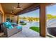 Outdoor patio with comfortable seating, offering seamless access to the sparkling pool and backyard oasis at 35443 N 87Th Pl, Scottsdale, AZ 85266
