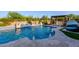 Luxurious pool with fountains, a pergola, and comfortable seating areas, perfect for outdoor entertainment at 35443 N 87Th Pl, Scottsdale, AZ 85266