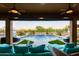 An outdoor patio view with a large pool, fountains, and landscaping, perfect for relaxing at 35443 N 87Th Pl, Scottsdale, AZ 85266