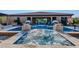 Inviting pool with a relaxing spa featuring stone accents and comfortable outdoor seating at 35443 N 87Th Pl, Scottsdale, AZ 85266