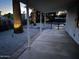 Covered back patio overlooking the fenced-in pool, perfect for outdoor entertaining at 3933 E Flower St, Phoenix, AZ 85018