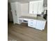 Features a built-in desk area with drawers and cabinets in the bright kitchen space at 3933 E Flower St, Phoenix, AZ 85018