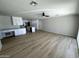 Spacious living room connected to the kitchen with modern appliances and ample storage at 3933 E Flower St, Phoenix, AZ 85018