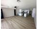 Open-concept living space flowing into a bright kitchen with modern finishes at 3933 E Flower St, Phoenix, AZ 85018