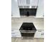 Stainless steel oven and microwave combo with white cabinets and granite countertops at 3933 E Flower St, Phoenix, AZ 85018