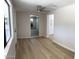 Inviting open area with a glimpse into another room and bright light throughout at 3933 E Flower St, Phoenix, AZ 85018