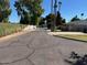 Quiet street with mature trees and well-kept homes at 3933 E Flower St, Phoenix, AZ 85018