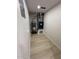 Utility closet features water heater and furnace with light-colored wood-look flooring at 3933 E Flower St, Phoenix, AZ 85018