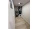 Utility room with modern flooring, water heater, and HVAC system at 3933 E Flower St, Phoenix, AZ 85018