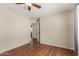 Bedroom featuring hardwood floors and an open doorway at 408 E Silverwood Dr, Phoenix, AZ 85048