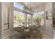 Dining room with contemporary light fixture, dining table, and chairs, perfect for gatherings at 408 E Silverwood Dr, Phoenix, AZ 85048