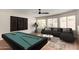 Entertaining game room featuring a billiards table, sofa, and decorative accents at 408 E Silverwood Dr, Phoenix, AZ 85048