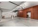 Spacious garage with built-in cabinets and ample storage space at 408 E Silverwood Dr, Phoenix, AZ 85048
