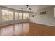 Bright living room with tile flooring, lots of windows, and neutral walls at 408 E Silverwood Dr, Phoenix, AZ 85048