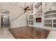 Spacious living room with wood floors, high ceilings, and bright natural light at 408 E Silverwood Dr, Phoenix, AZ 85048