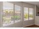 Bright windows overlooking the backyard area and providing natural light at 408 E Silverwood Dr, Phoenix, AZ 85048