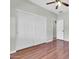 Bedroom featuring a ceiling fan, closet, and neutral paint for a comfortable and stylish retreat at 4323 S Ranger Trl, Gilbert, AZ 85297