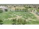 Expansive community field, featuring lush green grass and soccer goals, perfect for sports and outdoor activities at 4323 S Ranger Trl, Gilbert, AZ 85297