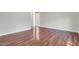 An open living room with laminated floors, ready to host memorable experiences at 4323 S Ranger Trl, Gilbert, AZ 85297