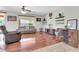 Inviting living room with ample seating, a large window, and stylish decor at 4323 S Ranger Trl, Gilbert, AZ 85297