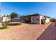 View of the backyard with gravel and a trampoline at 4403 N 56Th Dr, Phoenix, AZ 85031