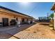 Large backyard with covered patio and solar panels at 4403 N 56Th Dr, Phoenix, AZ 85031