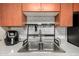 Close-up of a stainless steel kitchen sink with modern fixtures and a white subway tile backsplash at 4403 N 56Th Dr, Phoenix, AZ 85031