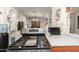Bright kitchen with view to the dining area, showcasing modern appliances and countertops at 4403 N 56Th Dr, Phoenix, AZ 85031