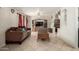 Comfortable living room showcasing a media center and cozy seating arrangement at 4403 N 56Th Dr, Phoenix, AZ 85031
