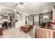 Bright living room featuring tile flooring, a ceiling fan, and open layout at 4403 N 56Th Dr, Phoenix, AZ 85031